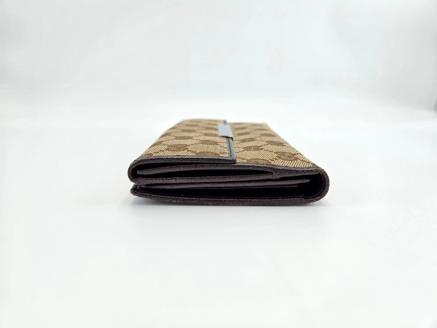     Gucci Engraved Metal Plate Clutch Wallet 