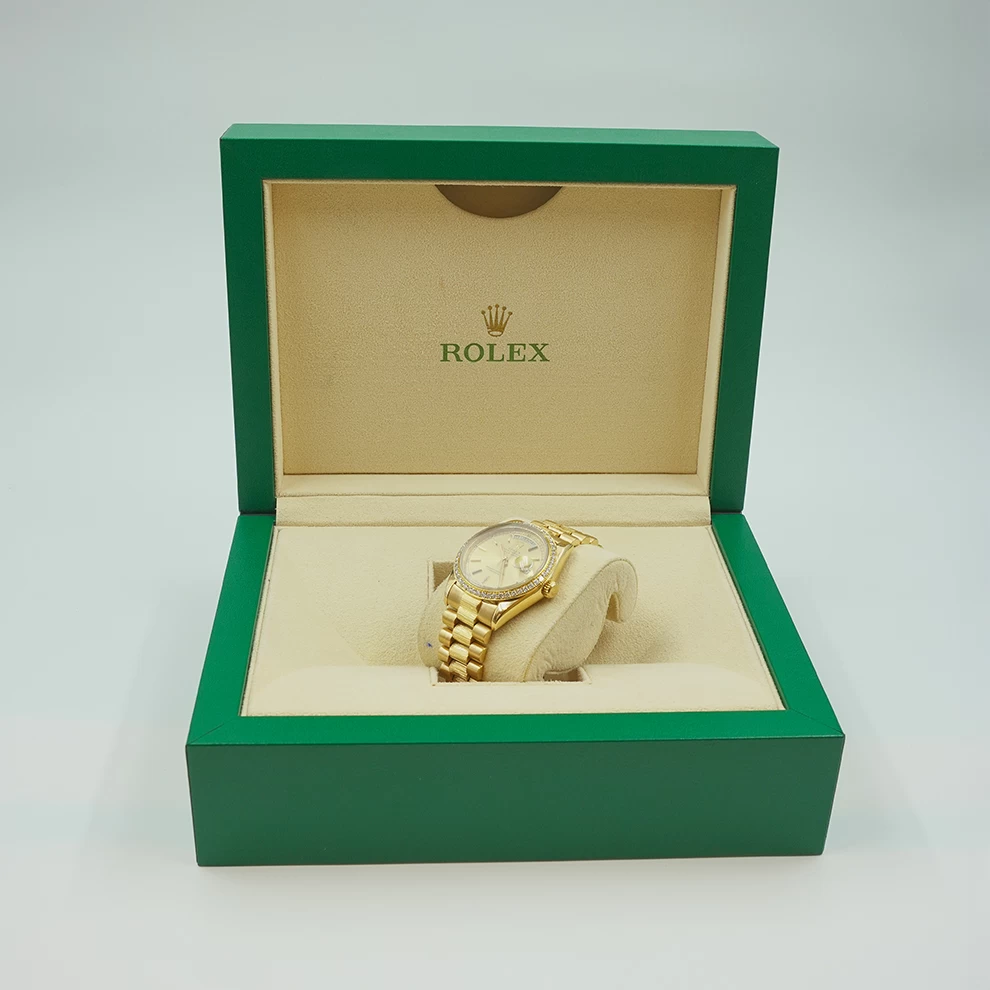 Rolex Day-Date 36 in Yellow Gold with Diamond Bezel