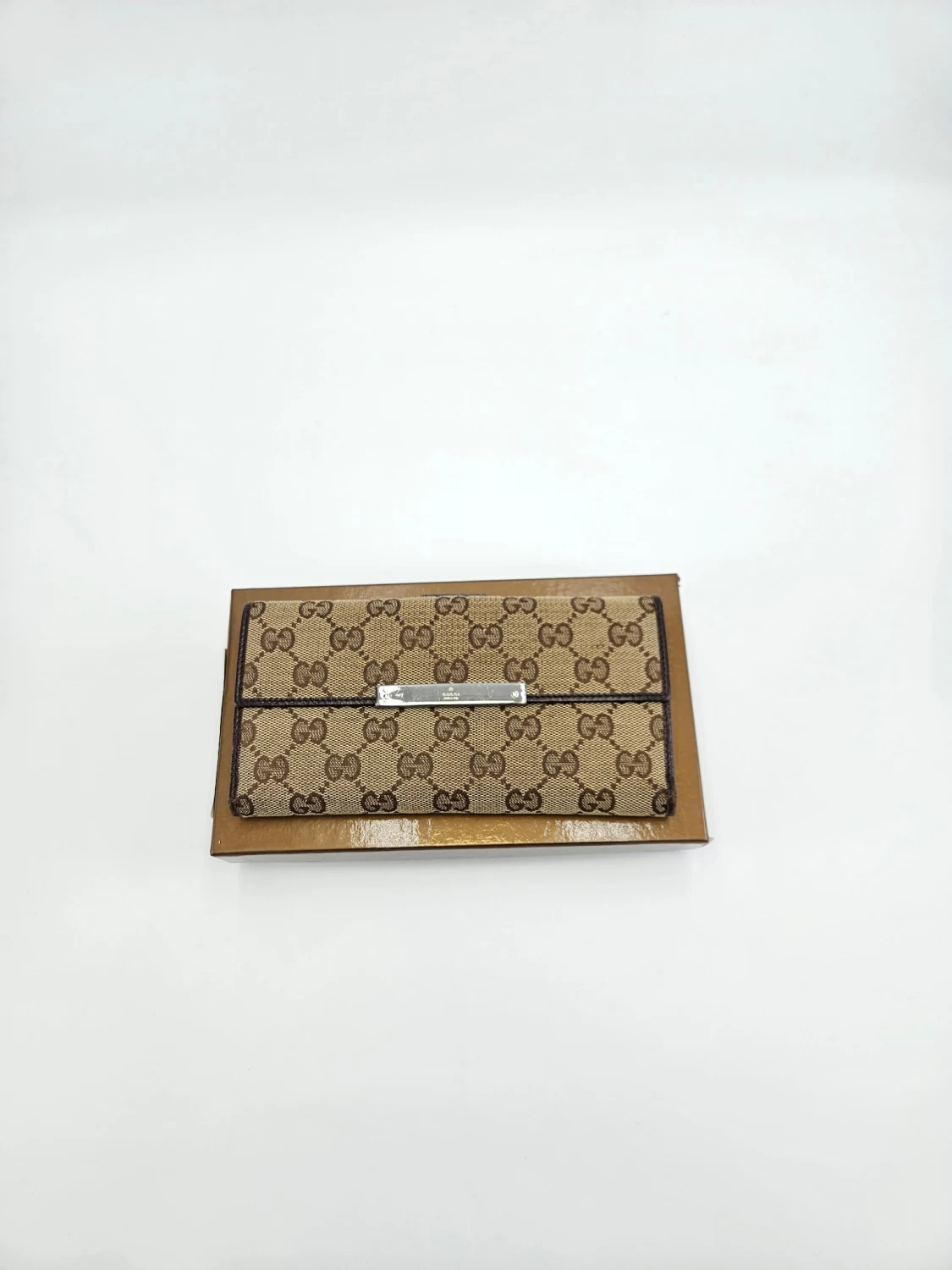     Gucci Engraved Metal Plate Clutch Wallet 