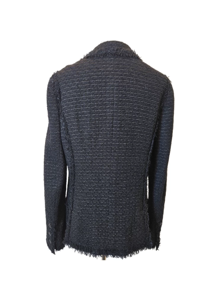     سترة شانيل تويد سوداء مزينة بالشراريب 