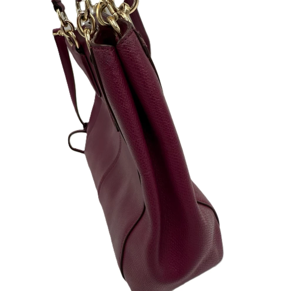     حقيبة توت كريستي كاريال من كوتش، مصنوعة من الجلد البنفسجي 