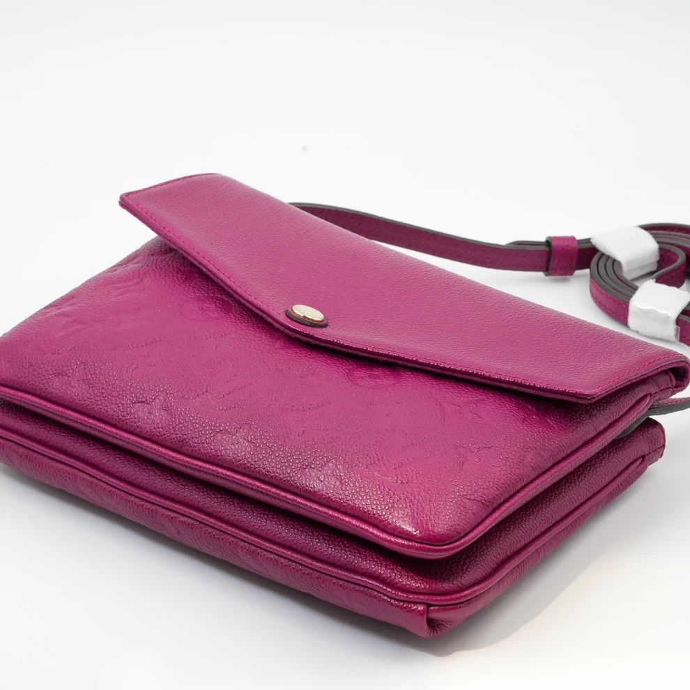     Louis Vuitton Flap Pouch in Fuchsia Monogram Empreinte 