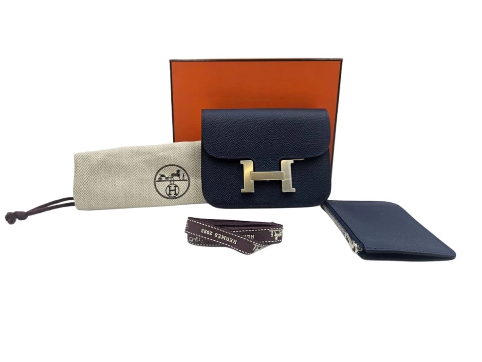     محفظة هيرميس كونستانس بلو نوي الجلدية النحيفة من جلد إبسوم، مزودة بإكسسوارات من البالاديوم، رقم الموديل 1010133243 