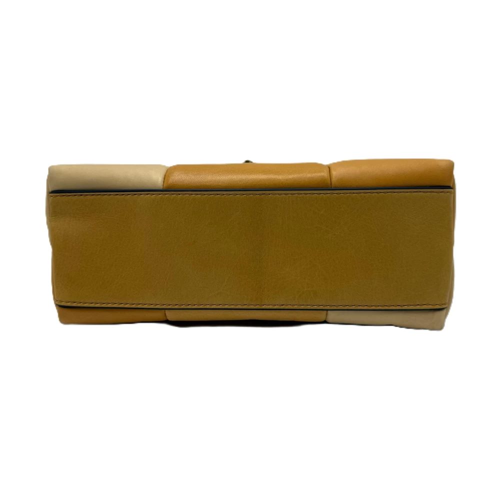     حقيبة توري بيرش كيرا المرقعة ذات المقبض العلوي 