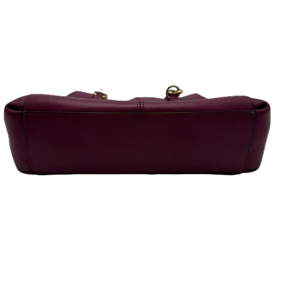     حقيبة توت كريستي كاريال من كوتش، مصنوعة من الجلد البنفسجي 