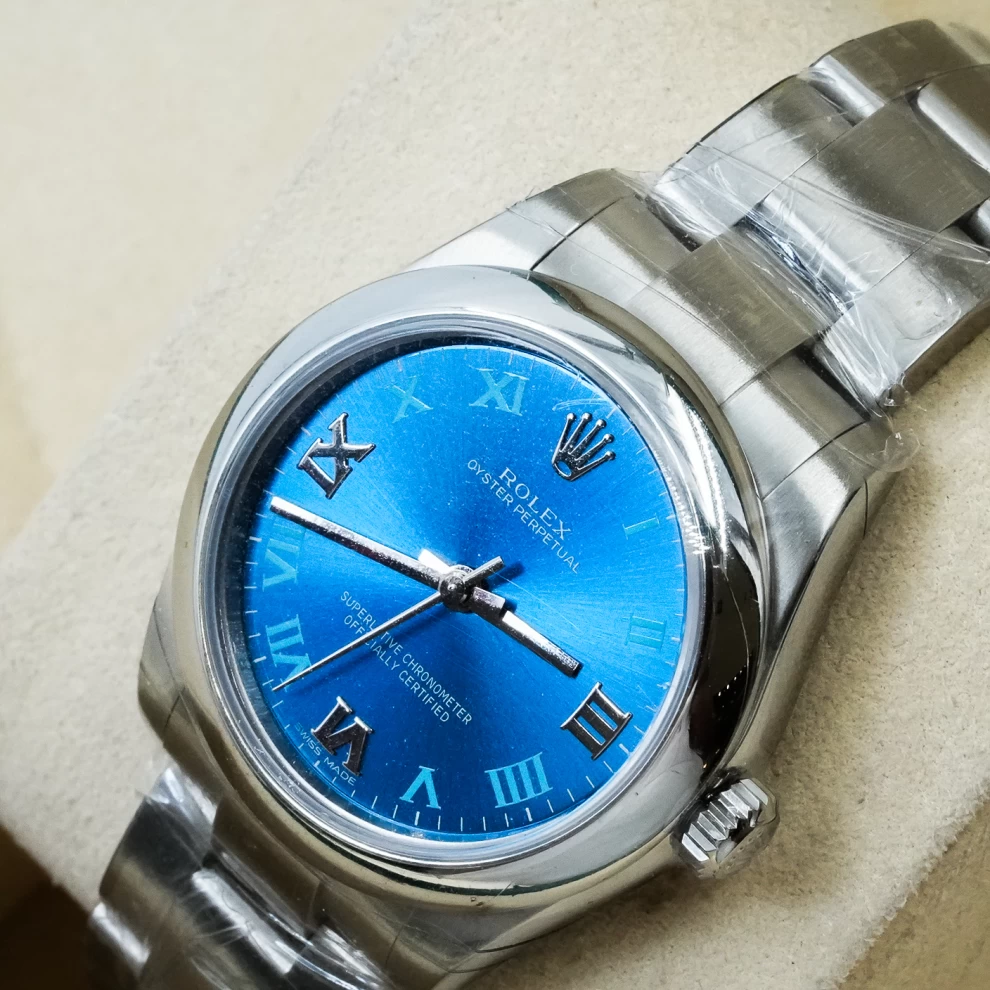     ساعة رولكس أويستر بيربيتوال ذات الميناء الأزرق 