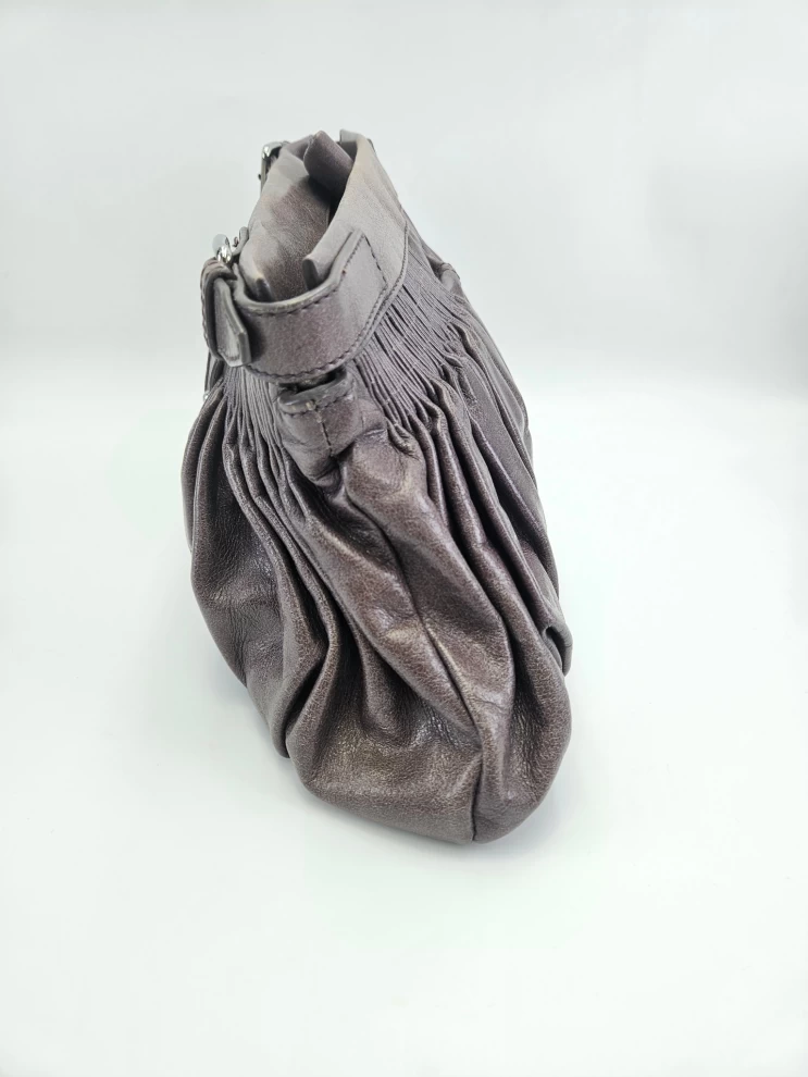     حقيبة كلاتش ميو ميو 