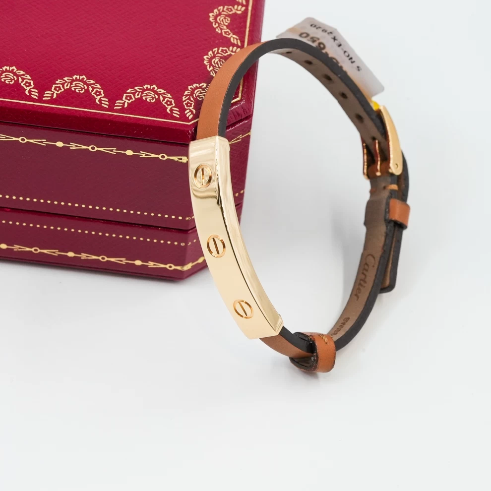     Cartier LOVE bracelet with a leather strap 
