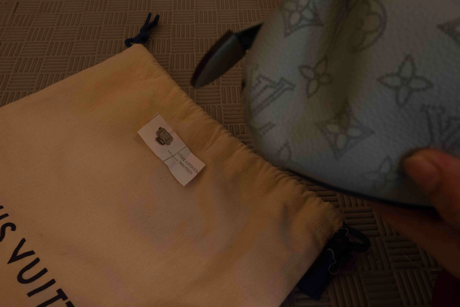 Louis Vuitton  Mahina Scala Mini Pouch