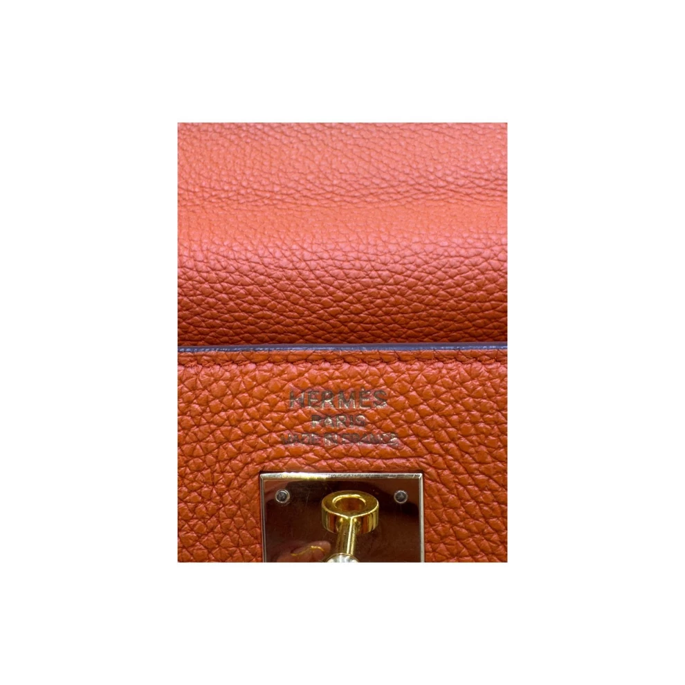     حقيبة هيرمس كيلي كليمنس الجلدية الذهبية مقاس 35 