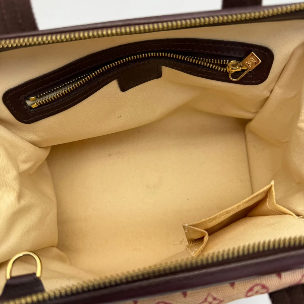     حقيبة يد Louis Vuitton Monogram Josephine Fuschia PM 