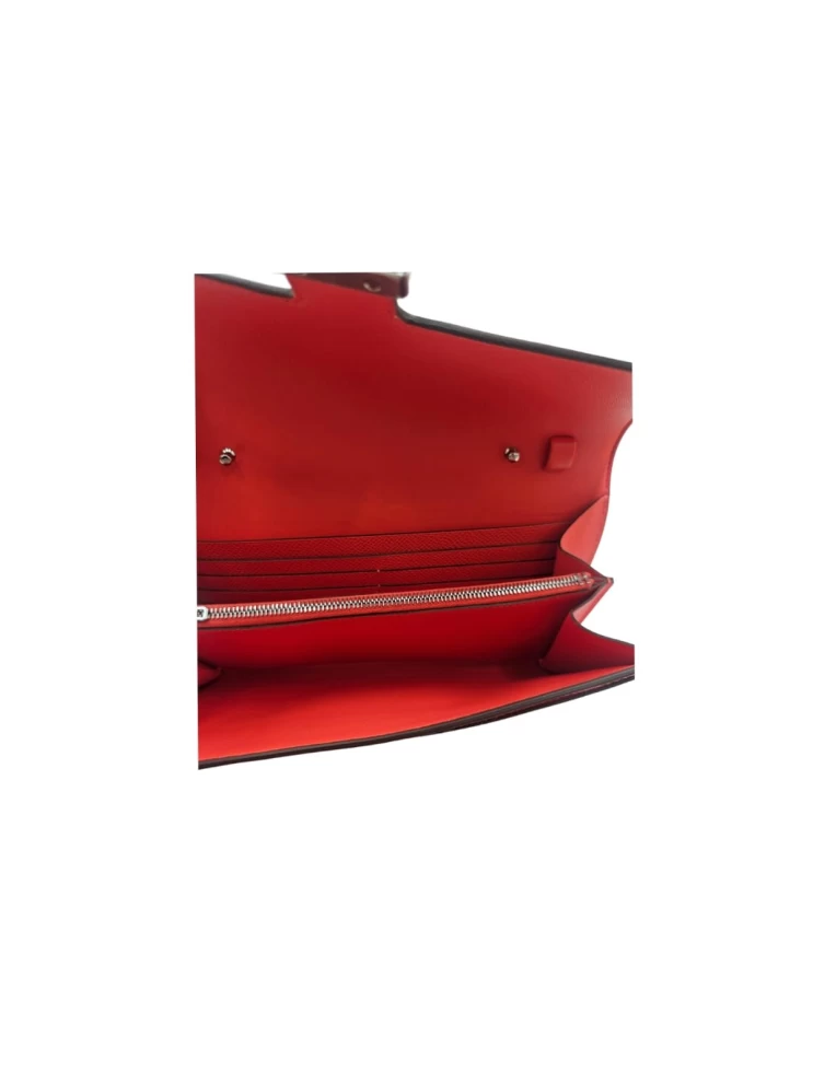     محفظة هيرميس كونستانس الطويلة من جلد إبسوم البرتقالي، مزودة بإكسسوارات من البالاديوم، رقم الموديل 