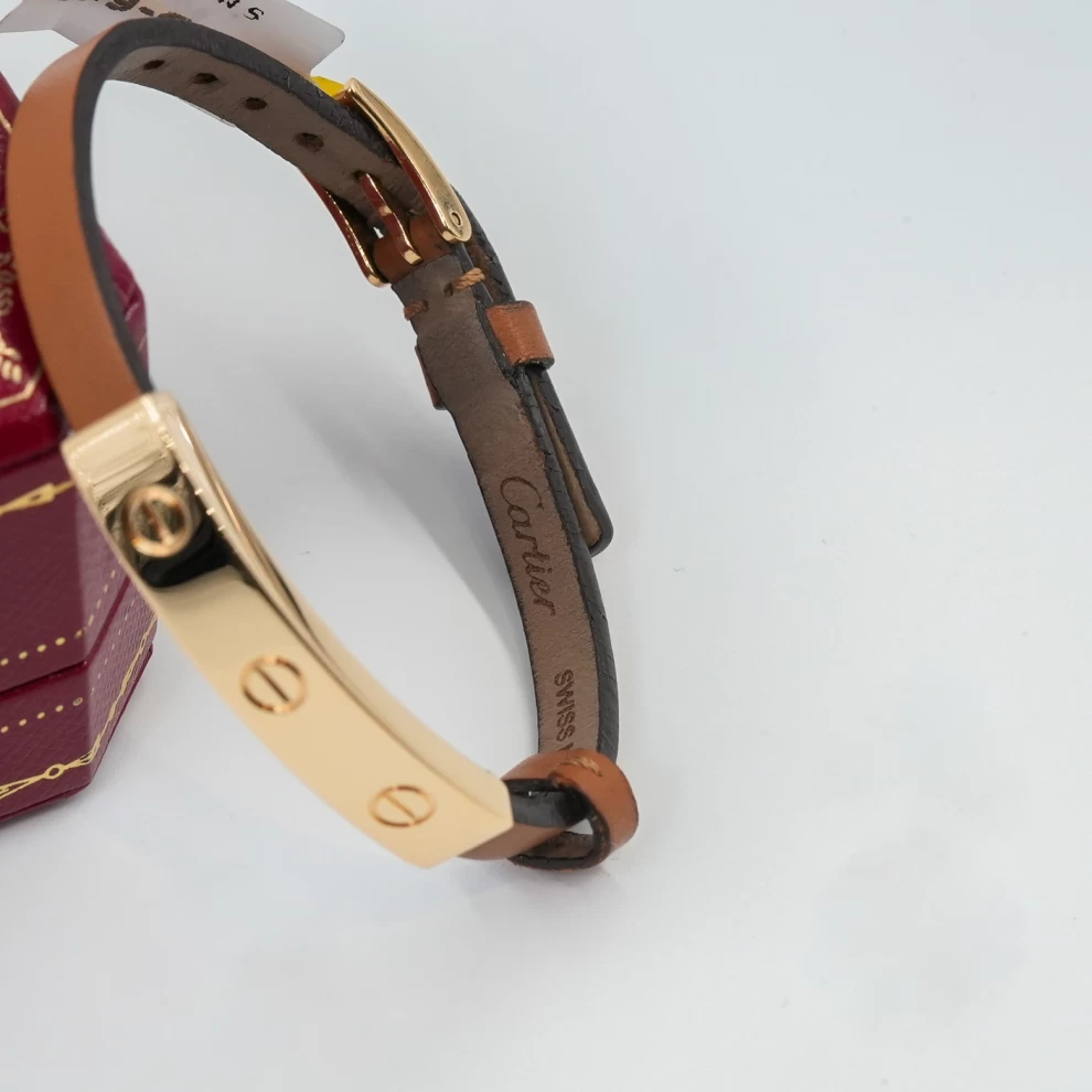     Cartier LOVE bracelet with a leather strap 