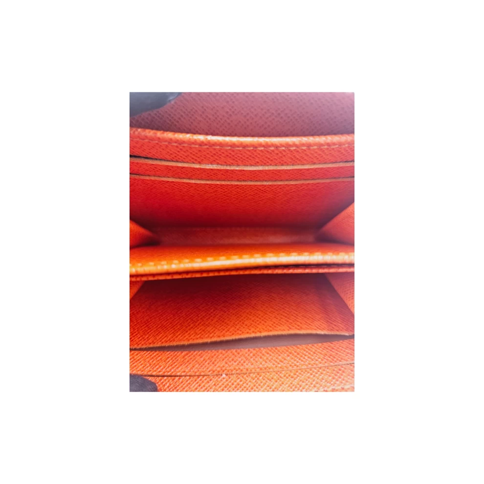     محفظة لويس فويتون بيمنت إيبي زيبي من الجلد 