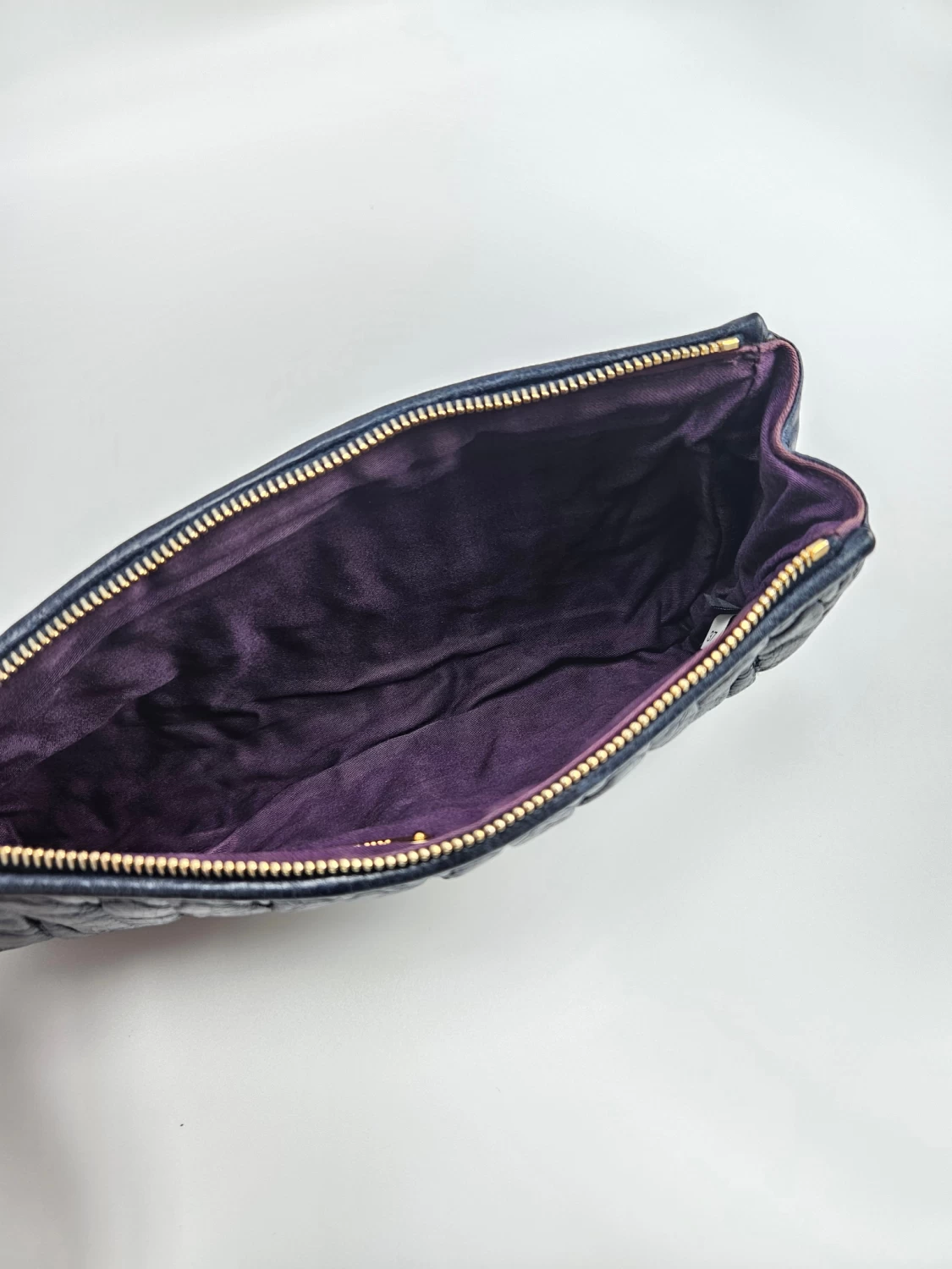     حقيبة كلاتش من الجلد Miu Miu Matelasse 