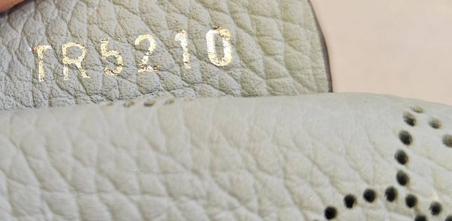 Louis Vuitton  Mahina Scala Mini Pouch