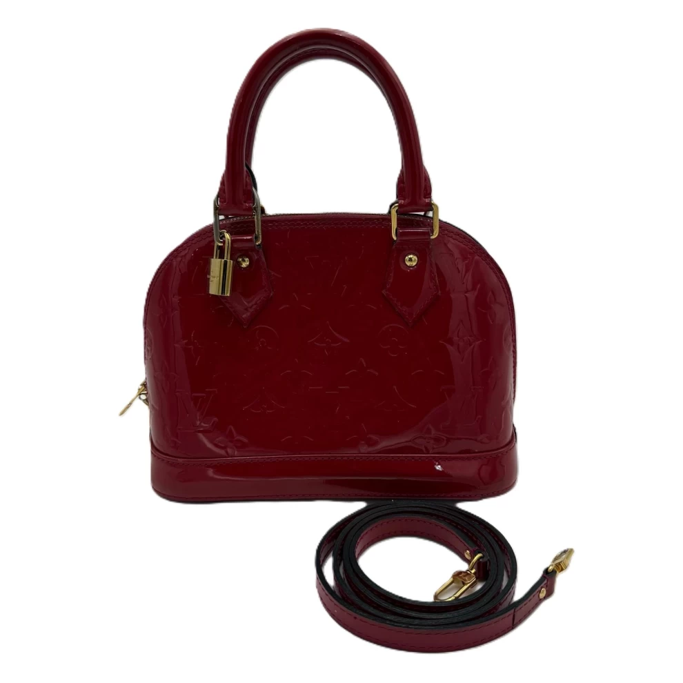     حقيبة لويس فويتون مونوغرام أحمر فيرنيس ألما BB 