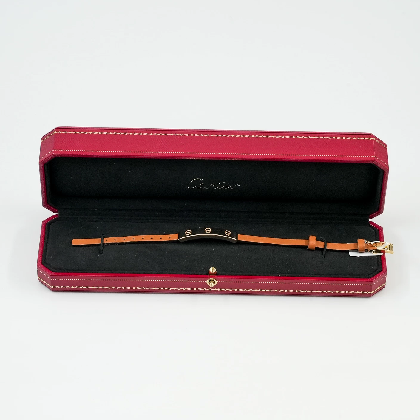     Cartier LOVE bracelet with a leather strap 