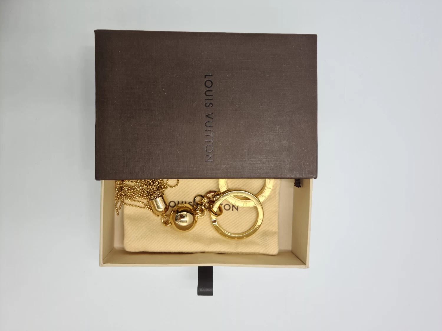     Louis Vuitton Gold Swing Key Holder and Bag Charm 