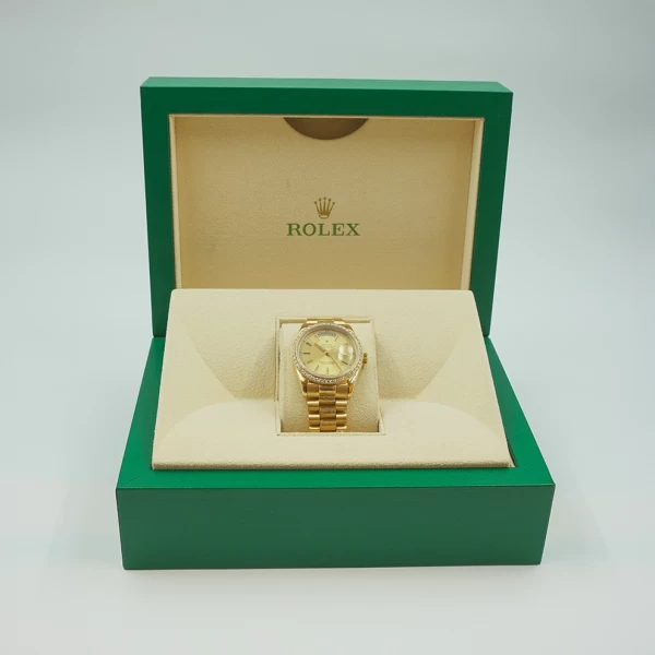 Rolex Day-Date 36 in Yellow Gold with Diamond Bezel