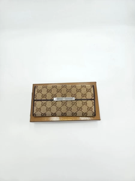 Gucci Engraved Metal Plate Clutch Wallet