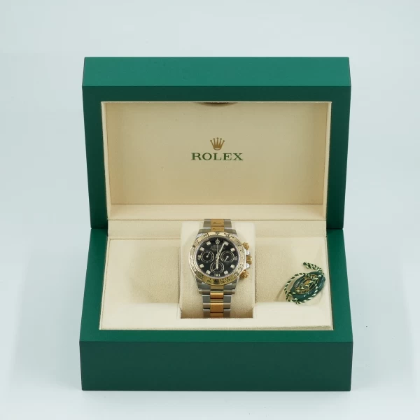 Rolex Cosmograph Daytona  featuring a two-tone steel and yellow gold